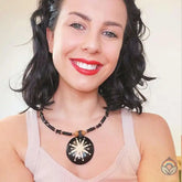 Carved Wood Round on Black Beaded Collar