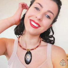 Carved Wood Oval on Red Beaded Collar