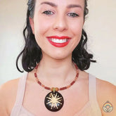 Carved Wood Round on Red Beaded Collar