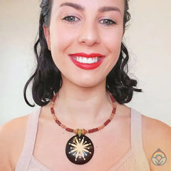 Carved Wood Round on Red Beaded Collar