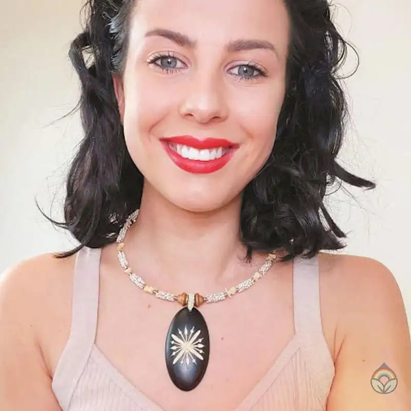 Carved Wood Oval on White Beaded Collar