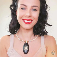 Carved Wood Oval on White Beaded Collar