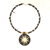 Carved Wood Round on Black Beaded Collar