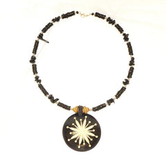 Carved Wood Round on Black Beaded Collar