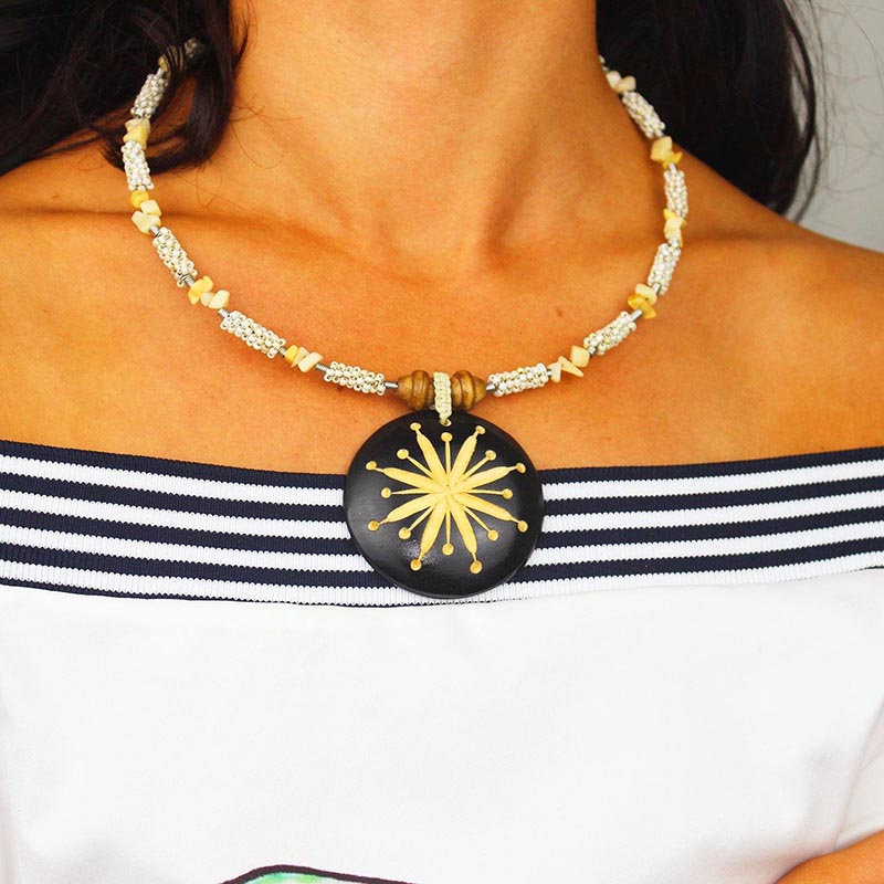 Carved Wood Round on White Beaded Collar