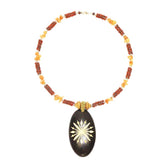 Carved Wood Oval on Red Beaded Collar