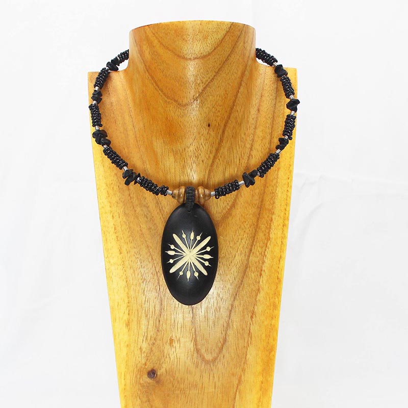 Carved Wood Oval on Black Beaded Collar