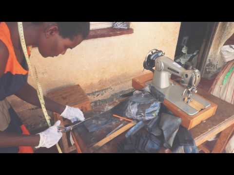 Load and play video in Gallery viewer, Upcycled Bicycle Inner Tube Wallet- The Ndalama

